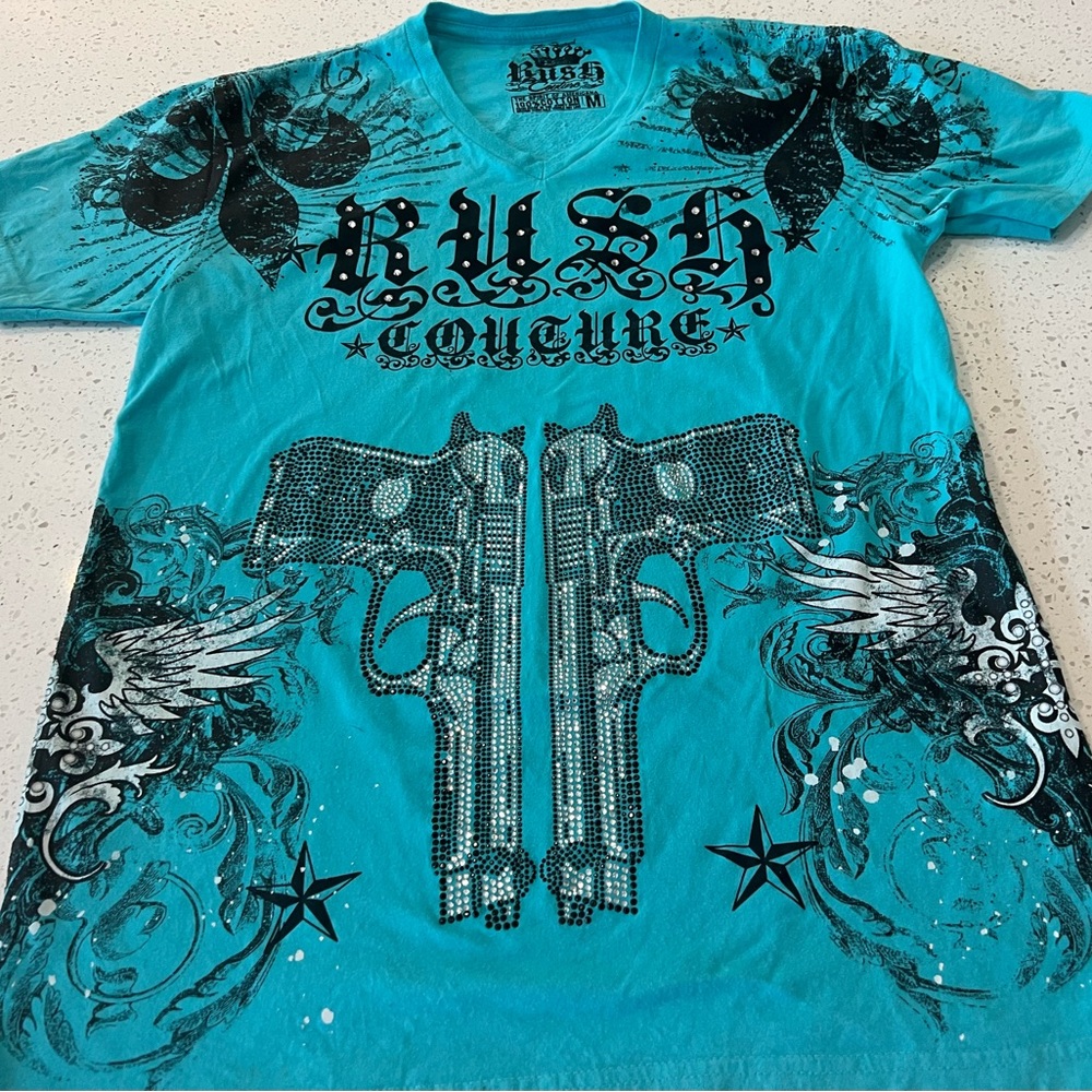 Size medium rush shirt .